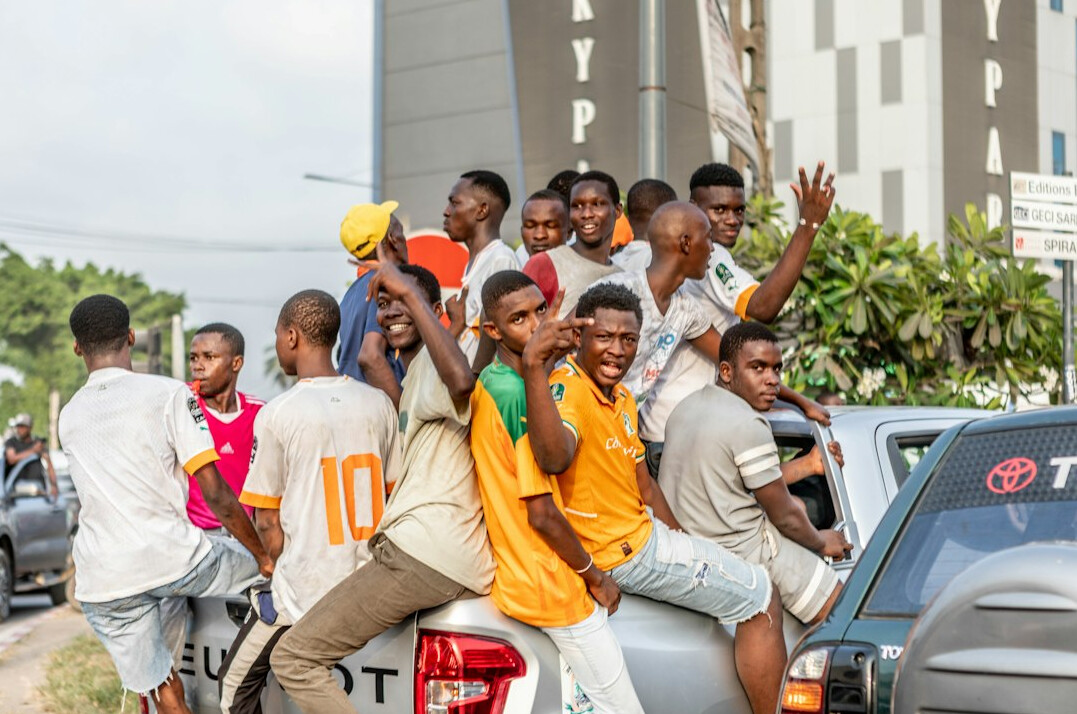 Group of young developers celebrating a project milestone