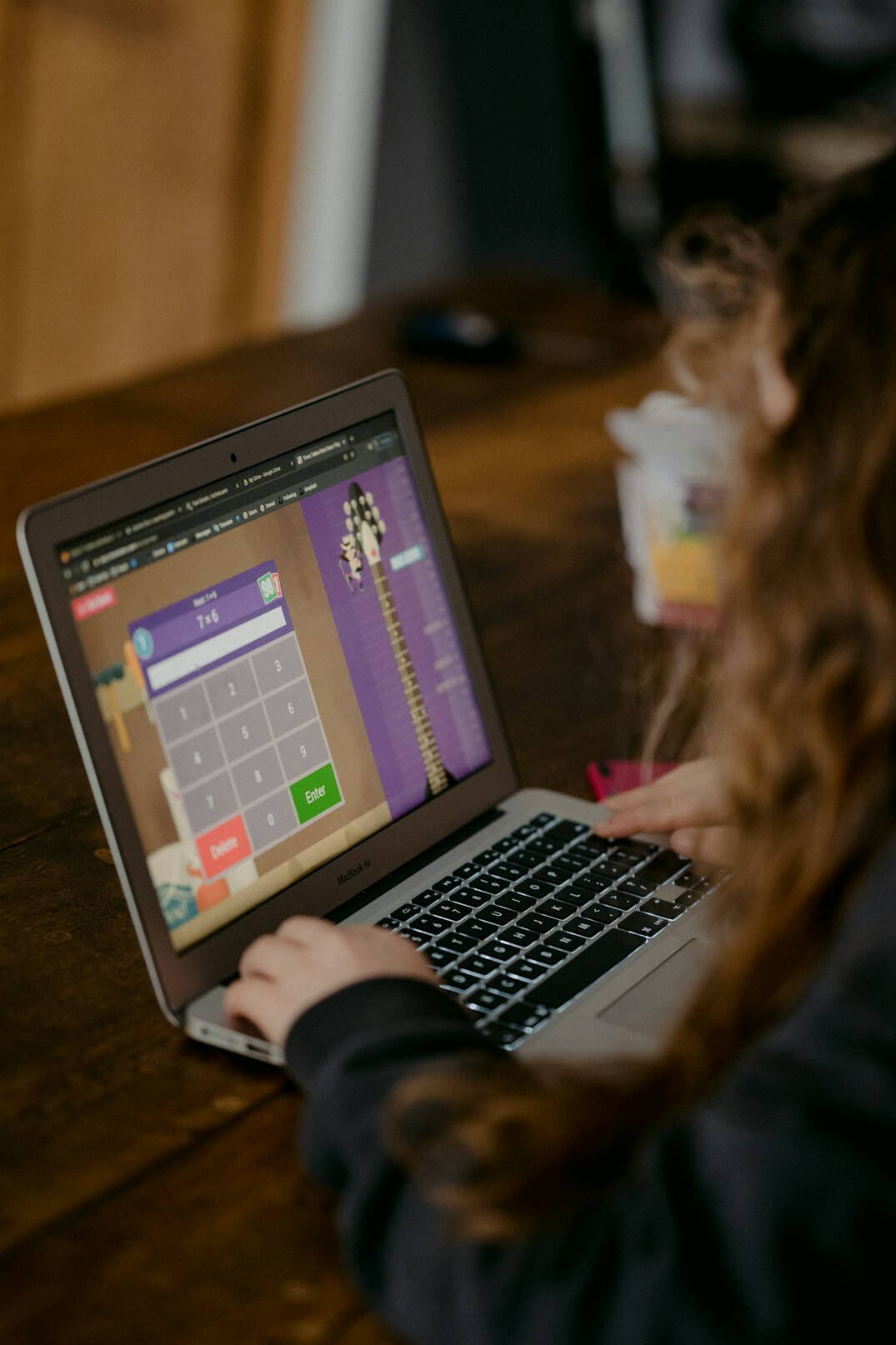 slovenian student coding on laptop