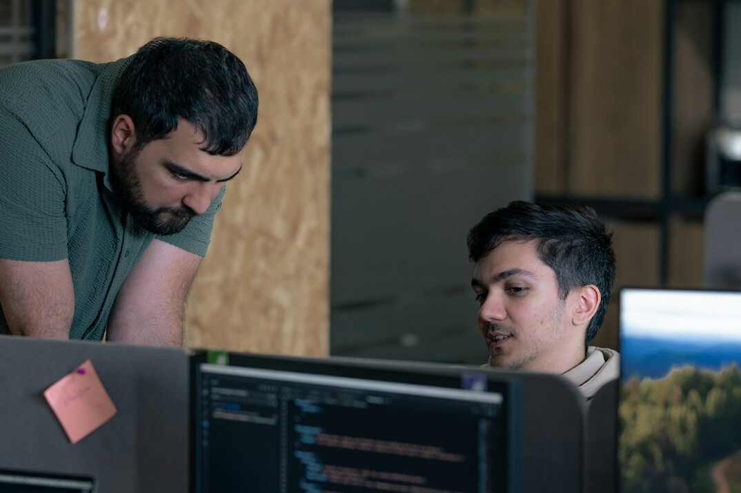 mentor helping student with code